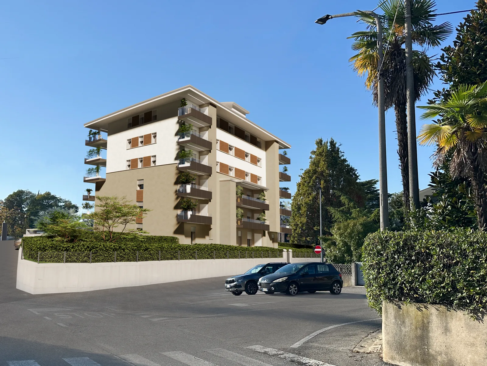 Palazzo San Valentino, veduta d'angolo da via Fonda con auto in sosta e palme